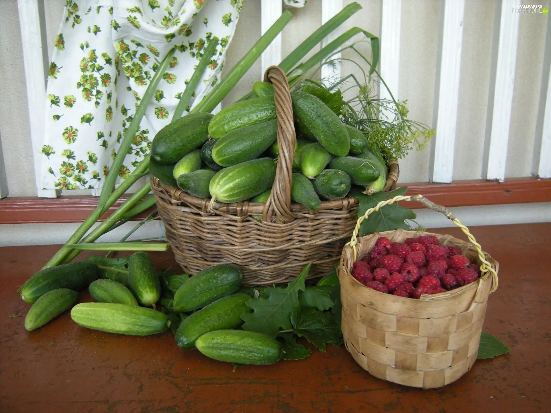 Baskets, raspberries, dill, cucumbers