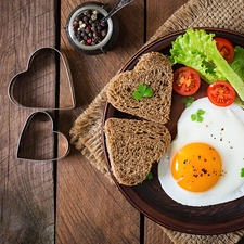 molds, bread, egg, tablecloth, Cherry tomatoes, breakfast, hearts, boarding, plate, lettuce