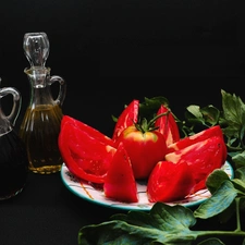 tomatoes, plate, oil, vinegar, basil, cut