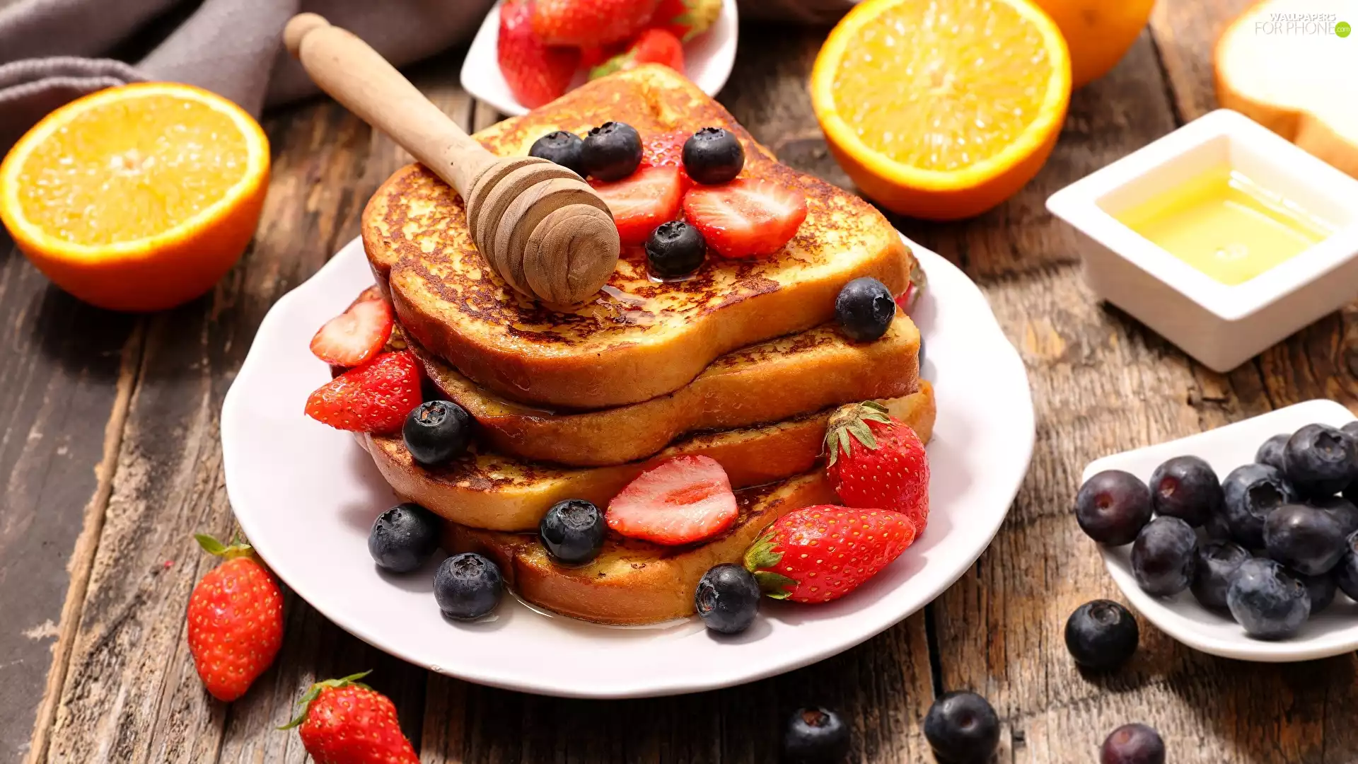 blueberries, toast, honey, boarding, orange, strawberries