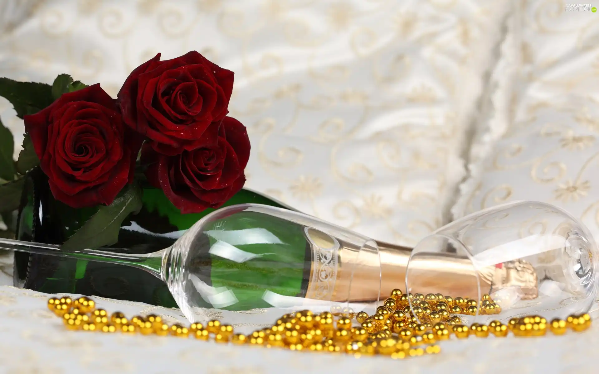 Champagne, roses, glasses