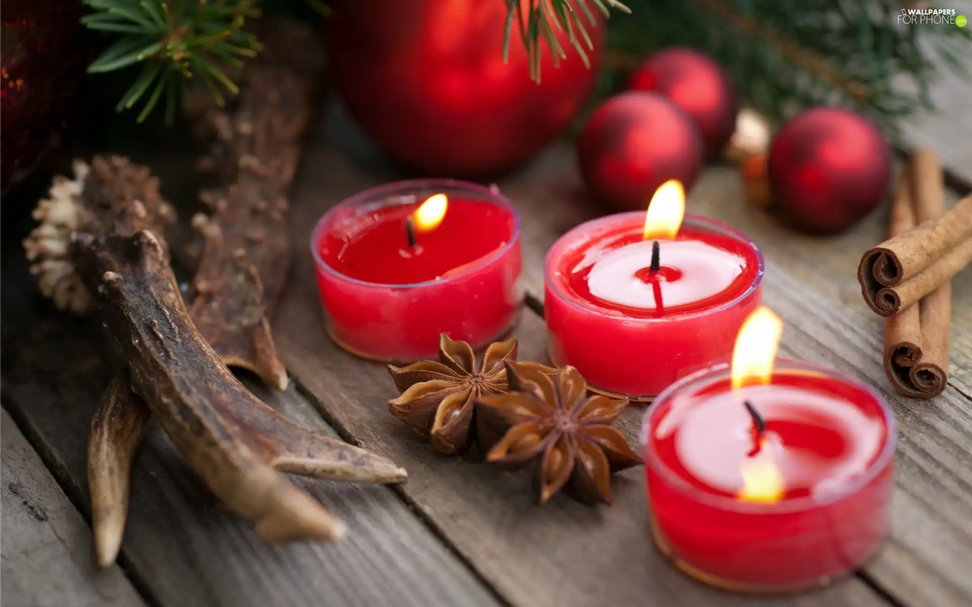 cinnamon, antlers, baubles, anise, candles