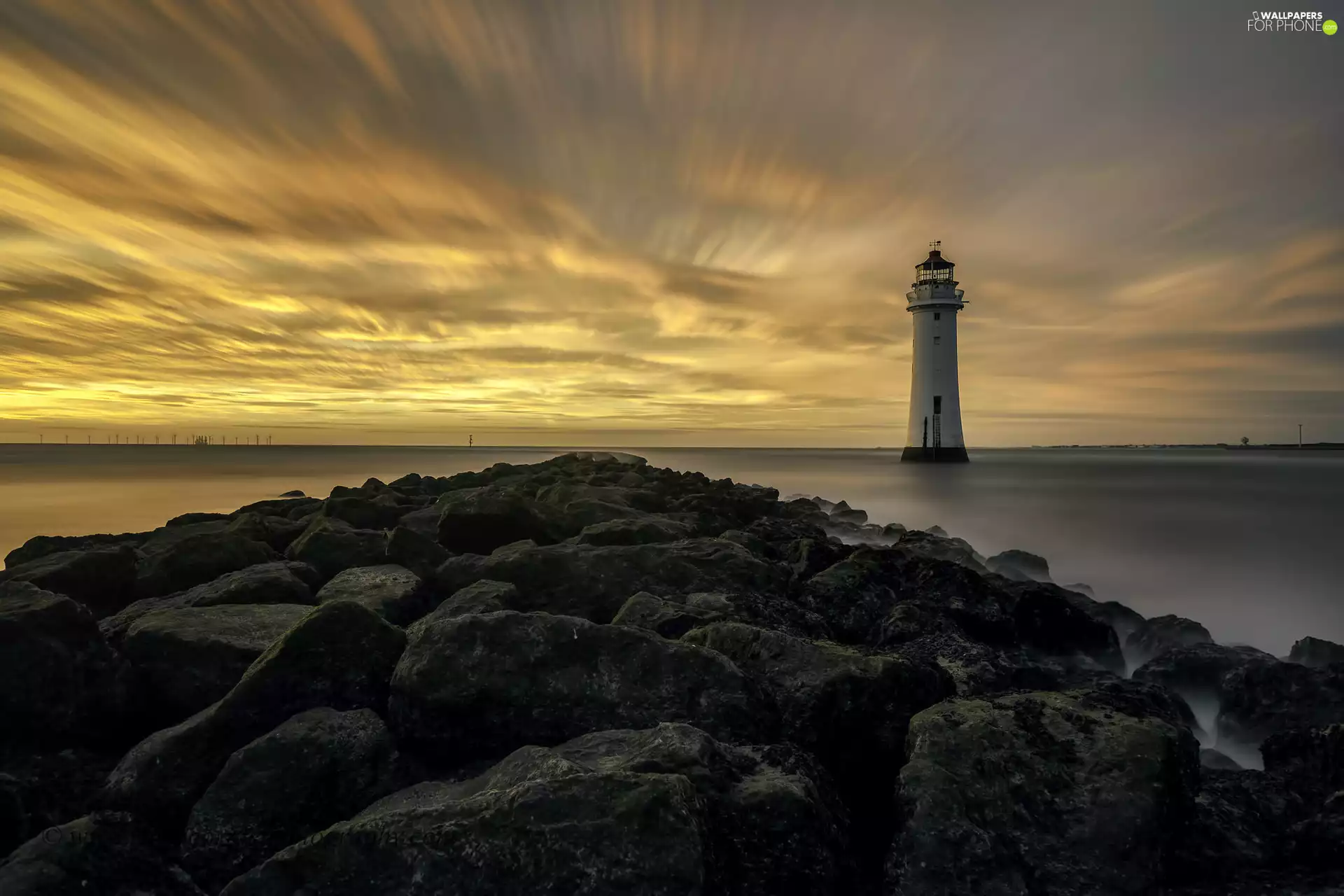 Stones, sea, Wirral Peninsula, New Brighton Lighthouse, England
