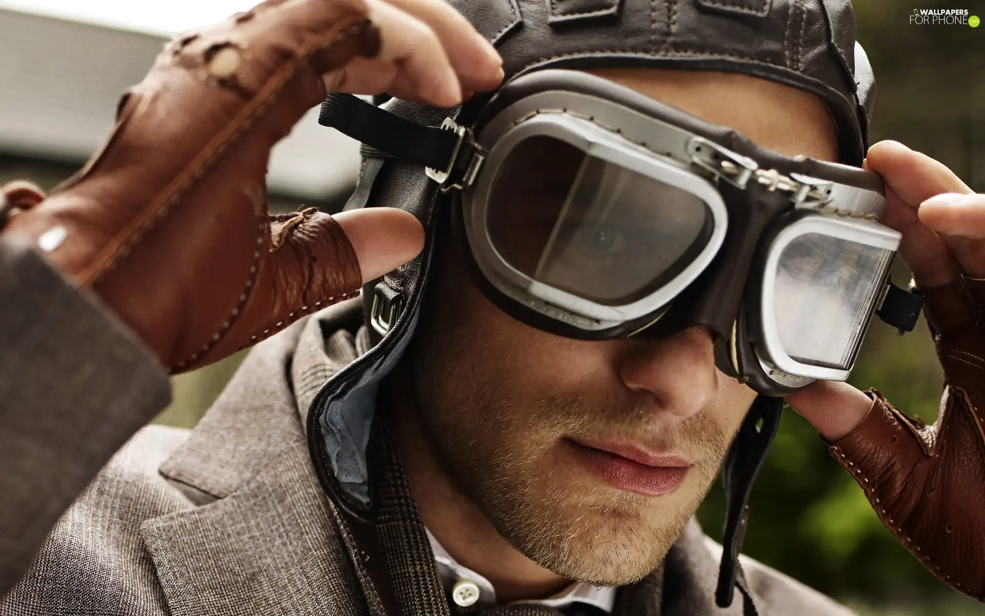 a man, goggles, pilot, model