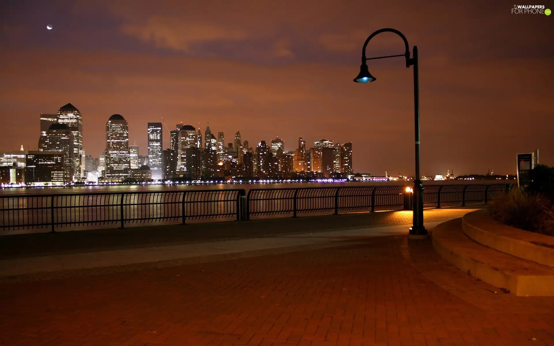 Lighthouse, skyscrapers