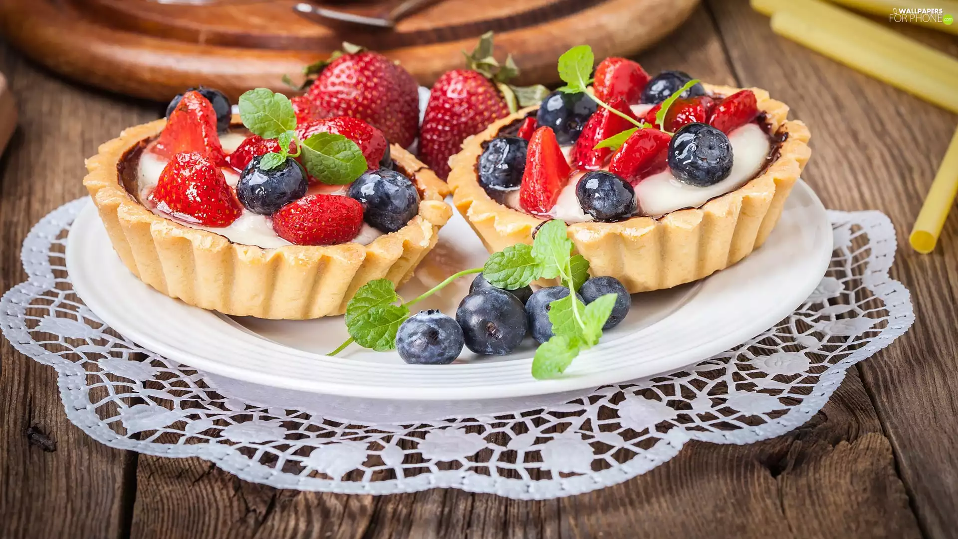 Muffins, blueberries, napkin, strawberries