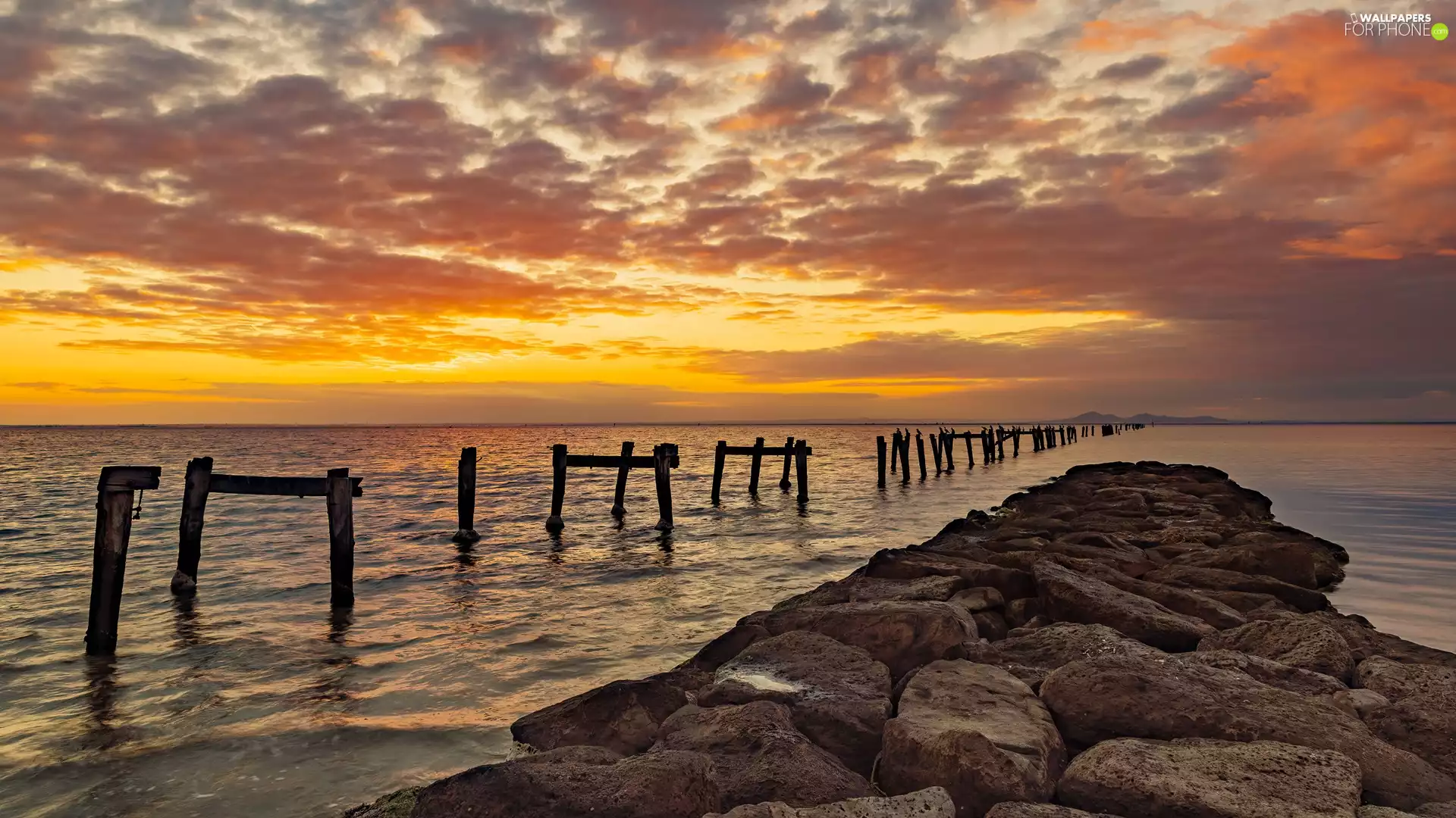 Pale, sea, Great Sunsets, clouds, rocks, wood