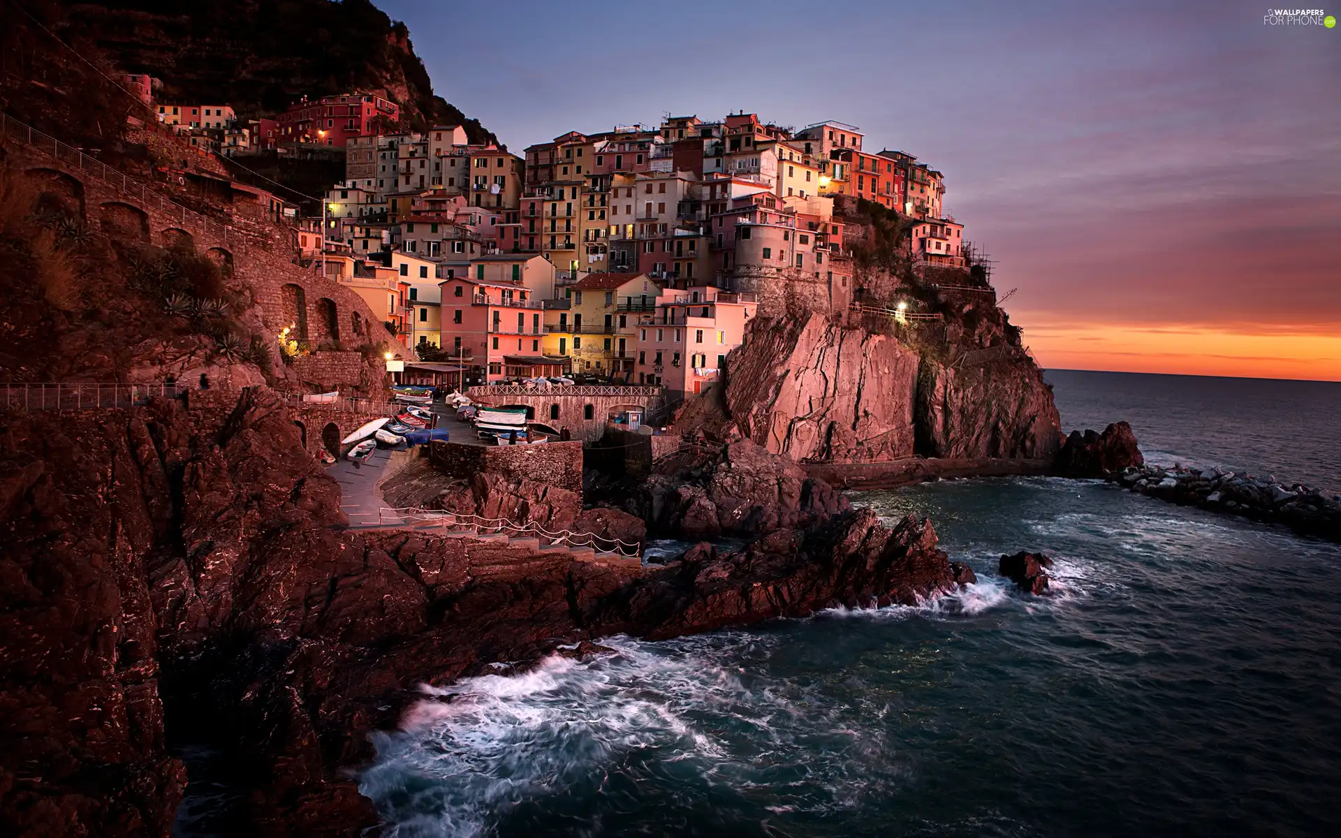 Town, rocks, sea