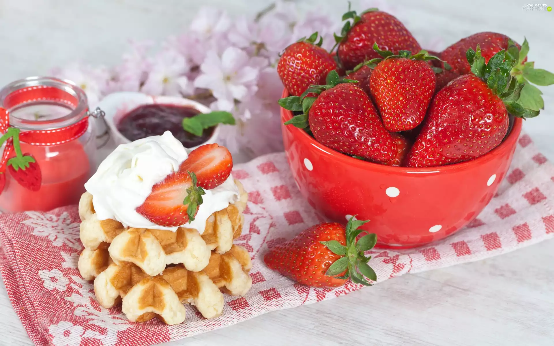 Whipped cream, strawberries, waffles